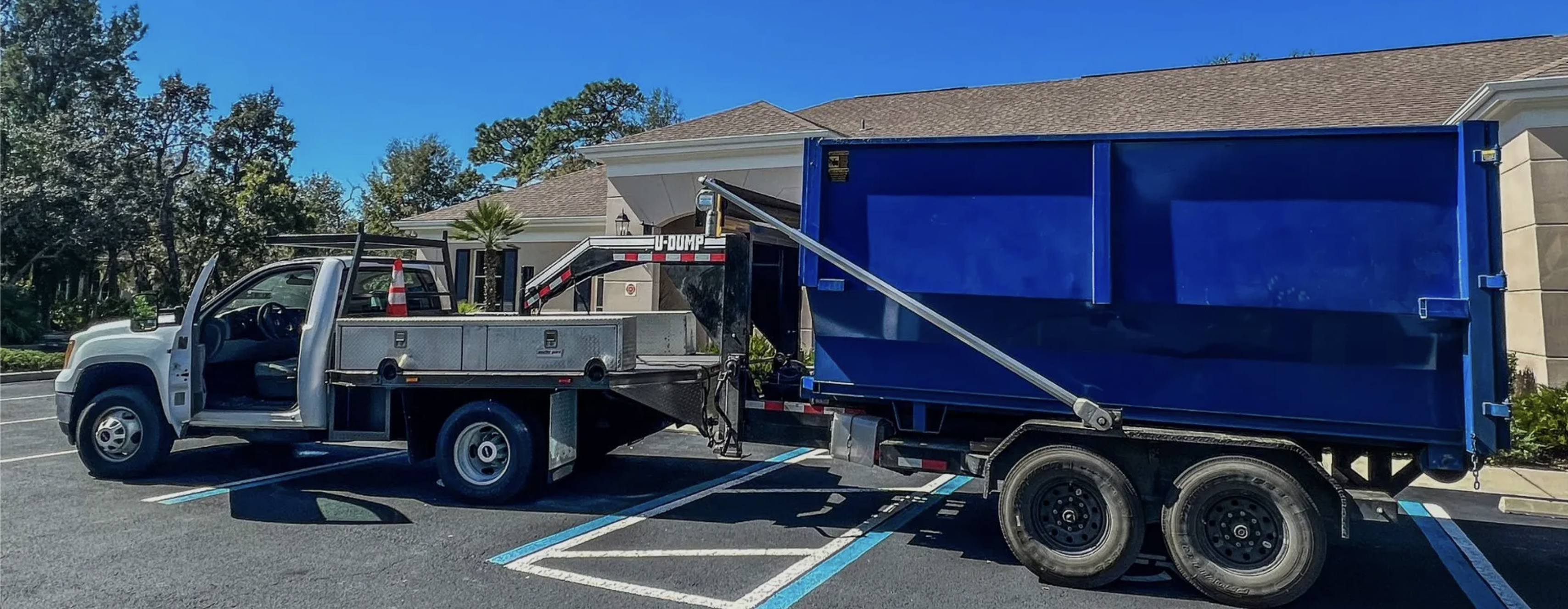 Blue Collar Junk Haulers ATL dumpster on site